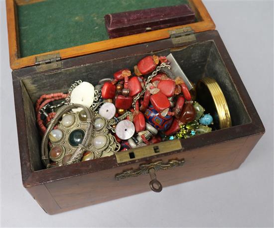 A tea caddy containing mixed costume jewellery and a amber cigar holder etc